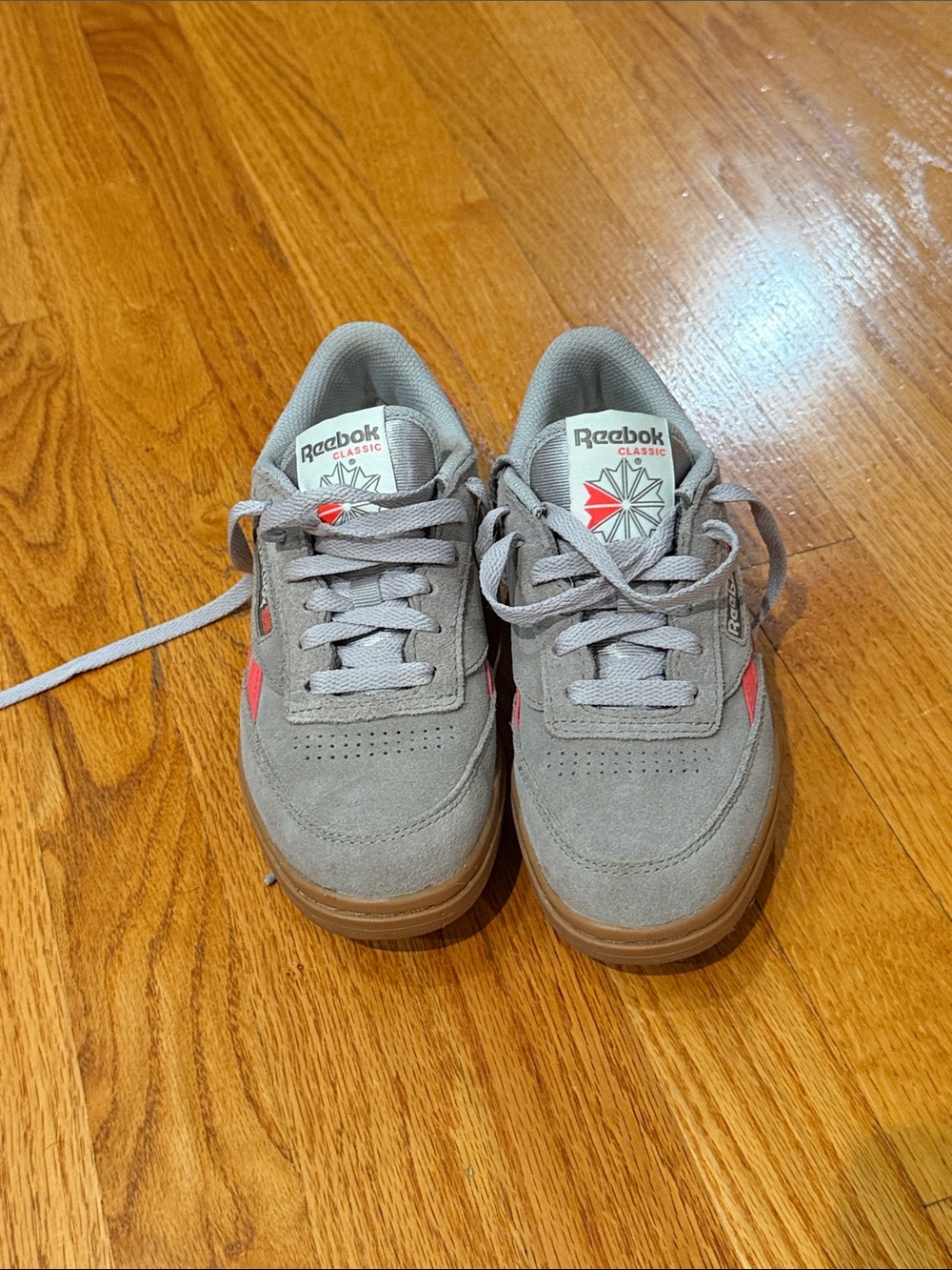 Reebok woman’s Gray Suede Sneakers with Pink Accents